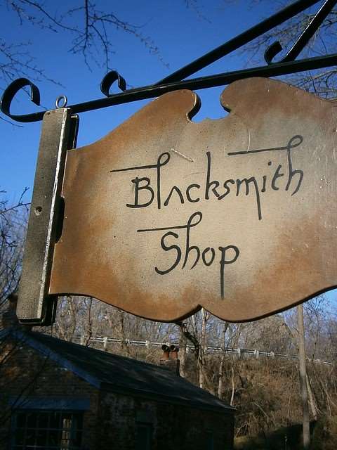 A sign for a blacksmith shop