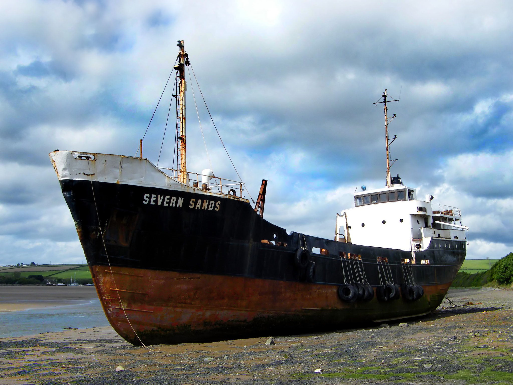 The rusty derelict dredger ship Severn Sands is run aground in Fremington Quay