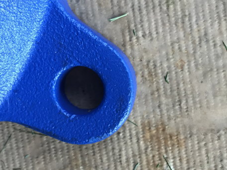 a close up a vise bolt hole