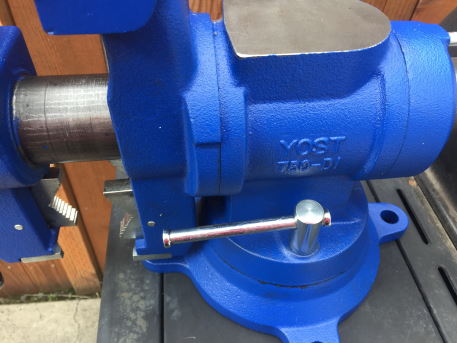 an image showcasing a casted ductile iron vise body with a blue coat of paint