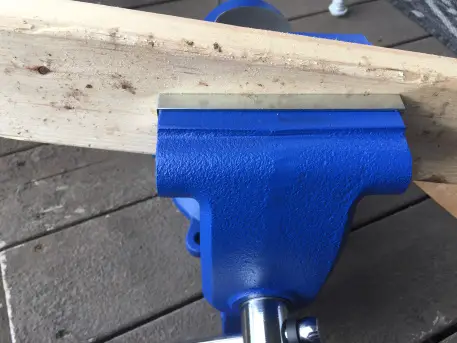 This is a metal working vise used to hold a cedar plank.