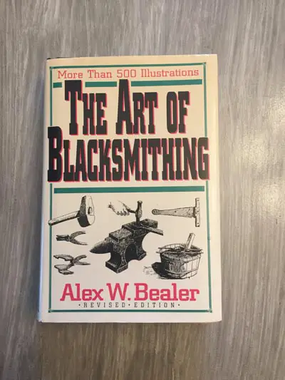 a picture of the front cover of "The Art Of Blacksmithing" by Alex W. Bealer